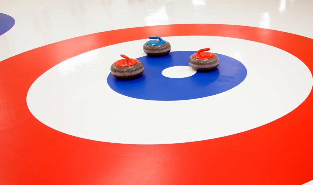 Three curling stones